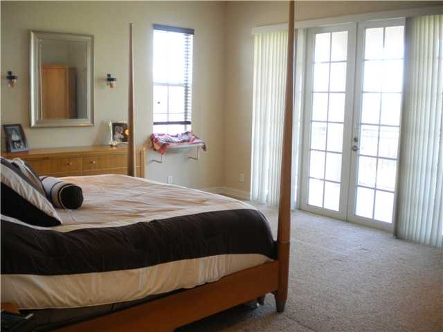 master bedroom with balcony