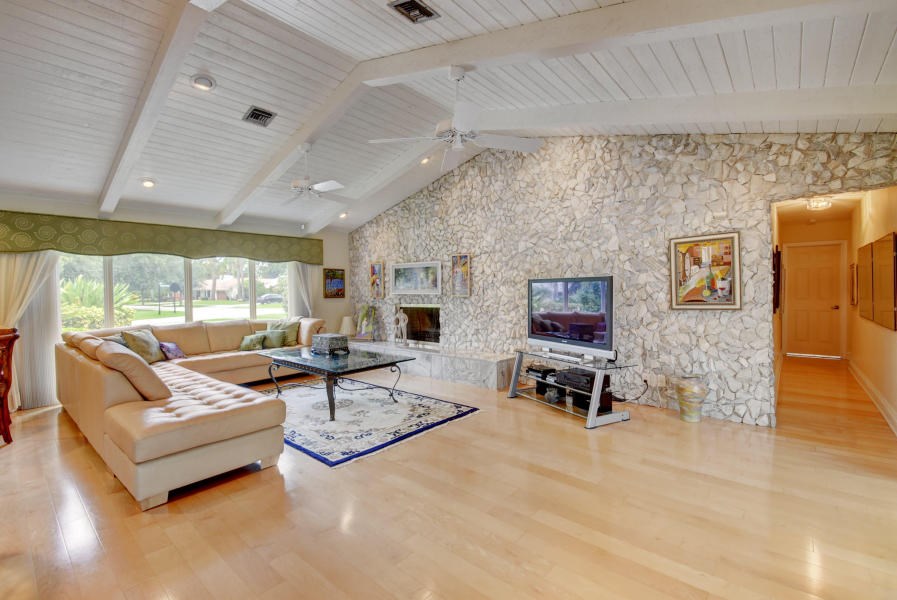 family room with wood burning fire place